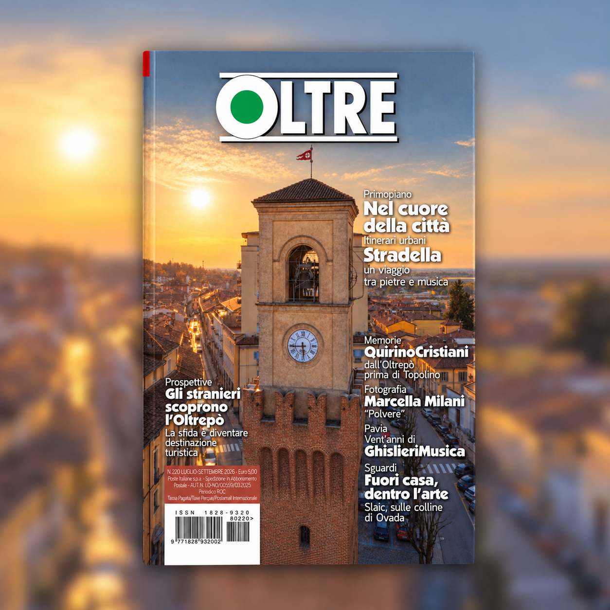 Rivista OLTRE 220 su sfondo sfocato
